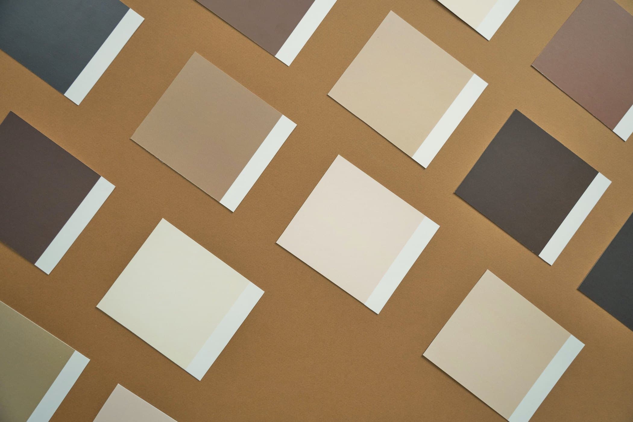 Fanned swatches of coloured and textured wrap papers